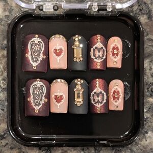 Elegant Nail Art Set with Black and Pink Accents